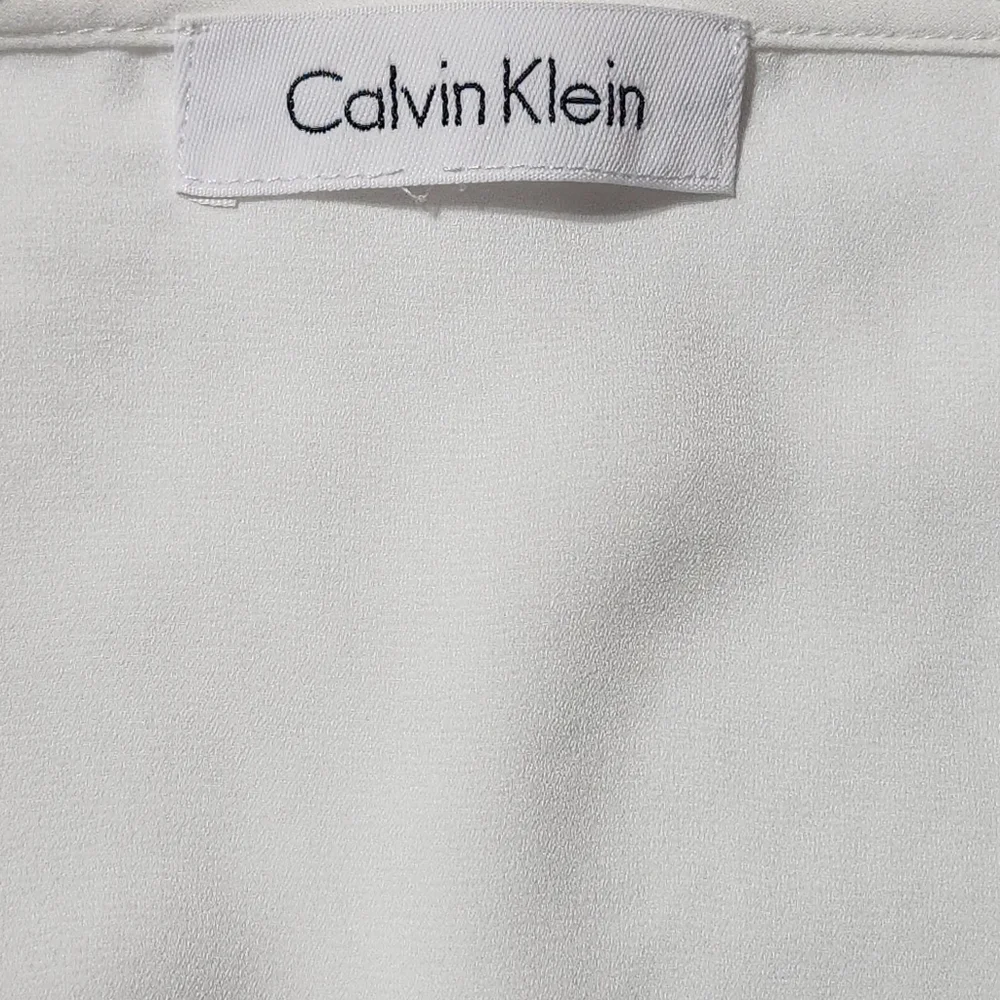 Calvin Klein Black, White, and Snakeskin Color Block V-neck Sleeveless Top